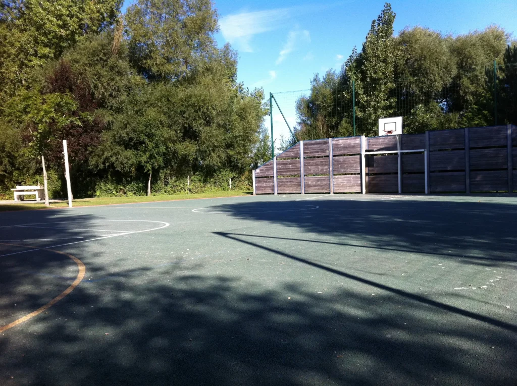 Outdoor basketball court in the sun